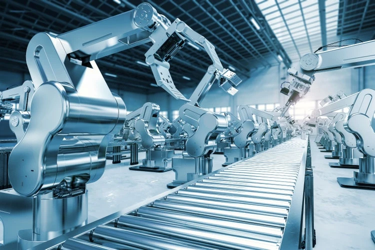 Illustrative industrial robotic arms along a production line